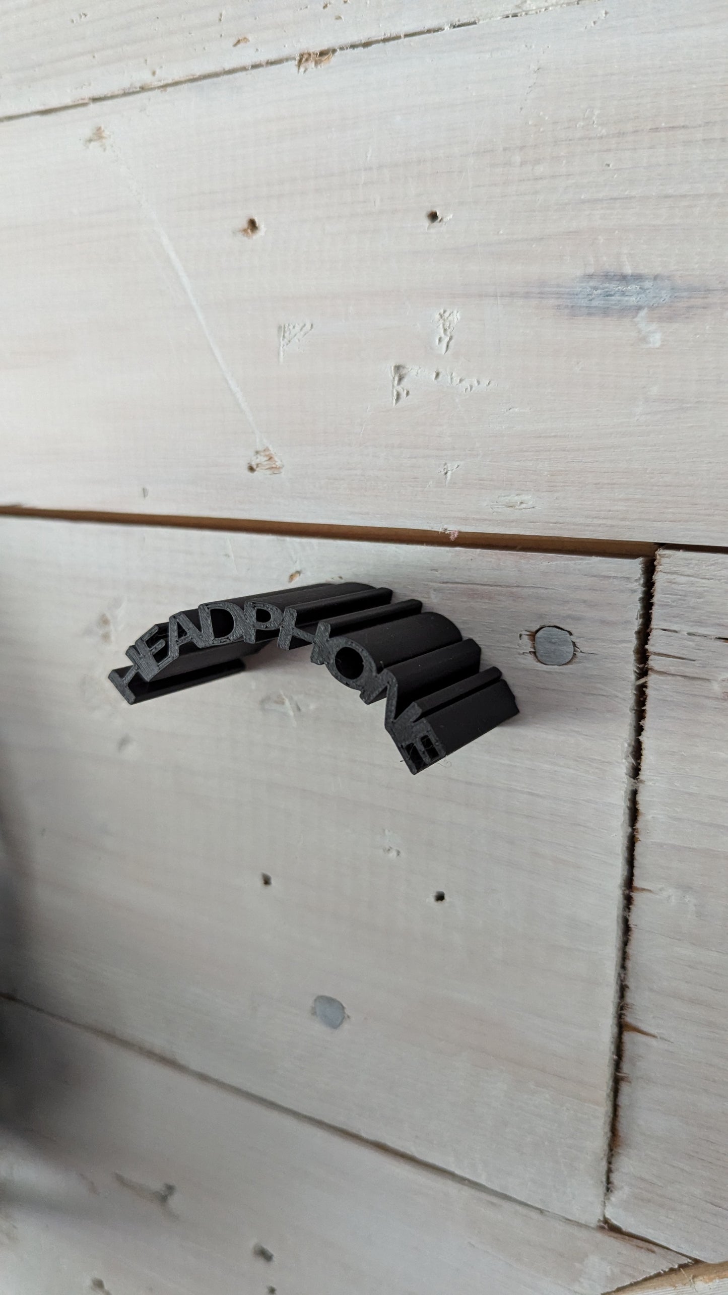 Hållare för hörlurar